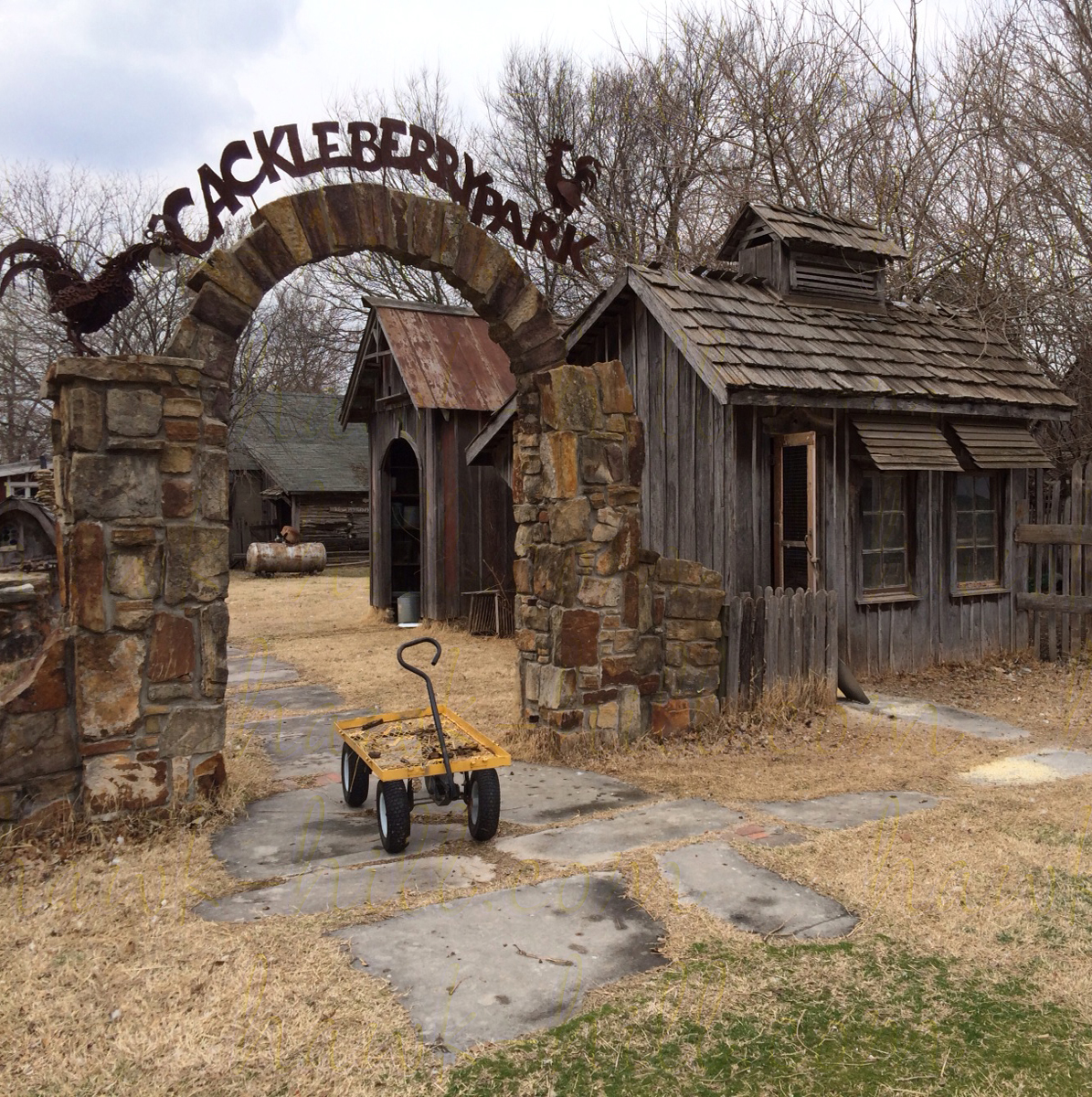 Rustic chicken coop with metal sign