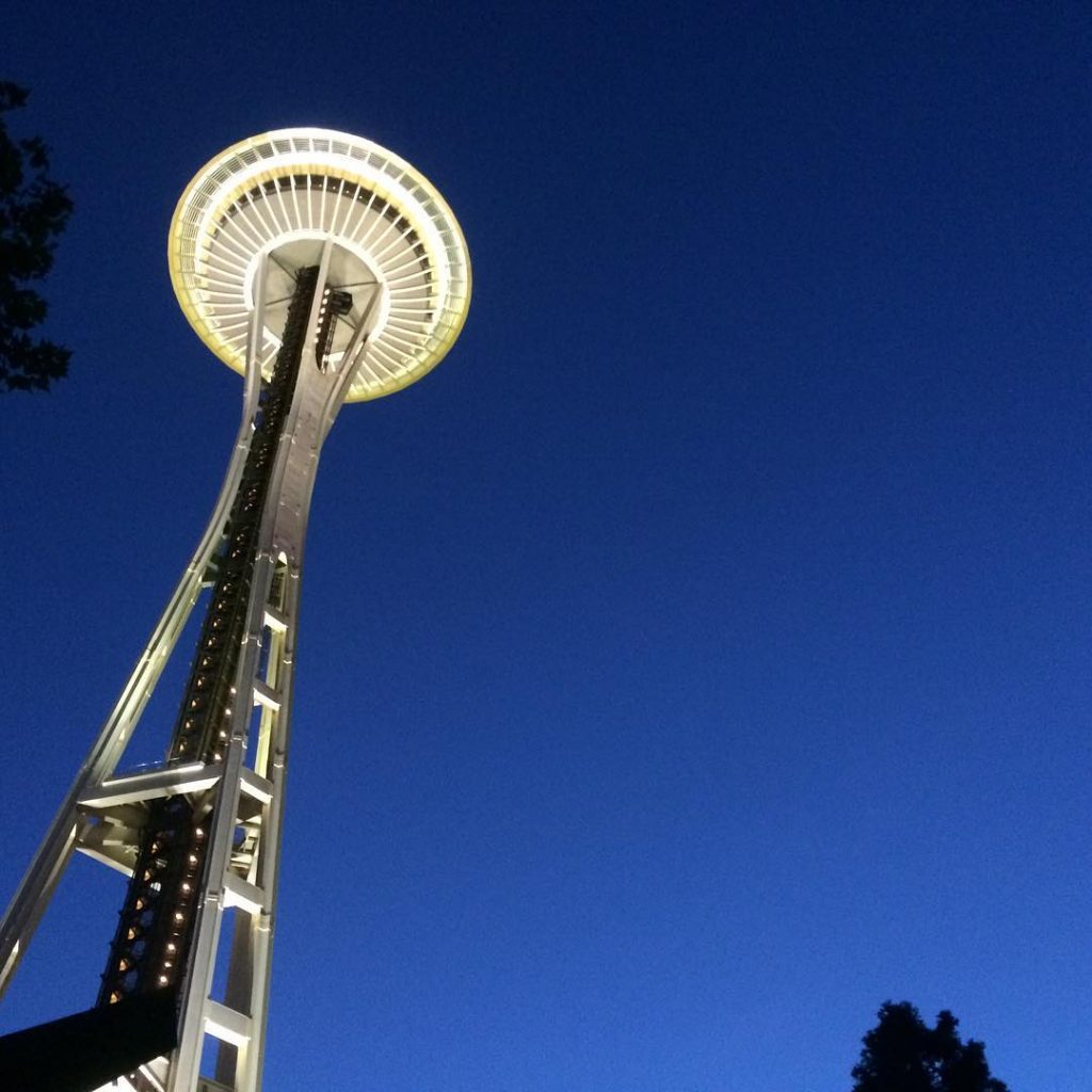 Image of the space needle at night from below.