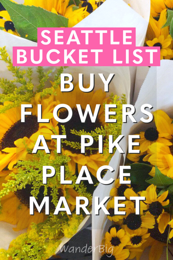 Text reads; seattle bucket list buy flowers at pike place market, with an image of flowers in the background.