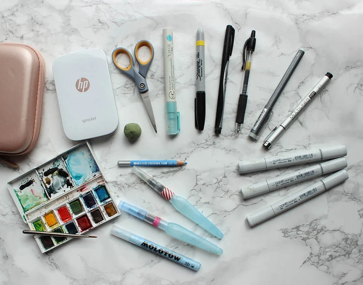 Just the essentials: a months worth of art supplies for a travel art journal kit