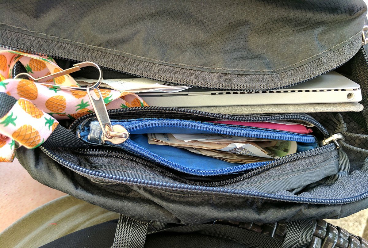 A counturse tethered to a northface  flyweight daypack.