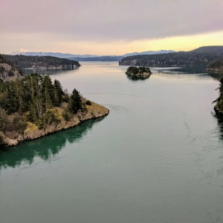 Deception Pass & The Cascade Mountains as seen from the bridge to Whidbey Island.