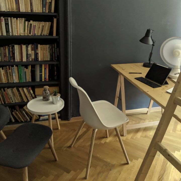 A laptop workspace in a modern short term rental apartment