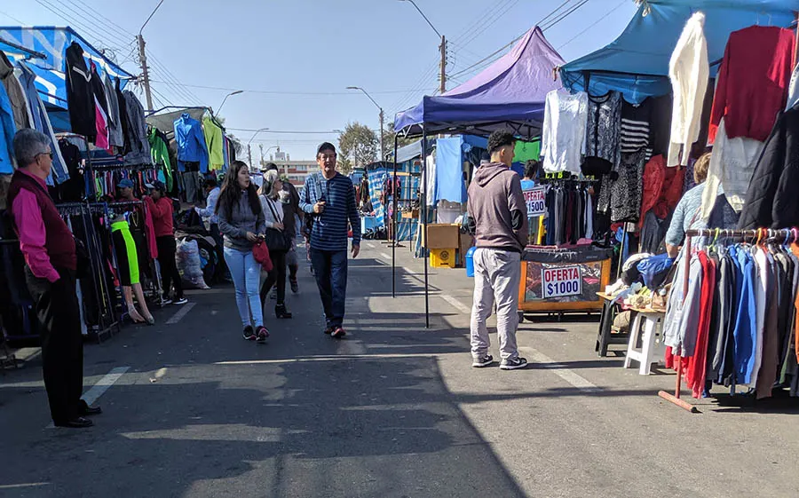 International flea markets can be a fun place to shop and learn about local culture for adventurous tourists