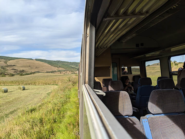 International train travel is immersive, as this split image taken of the romanian countryside from a train window shows.