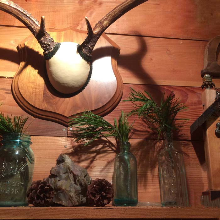 Evergreen boughs on a mantle