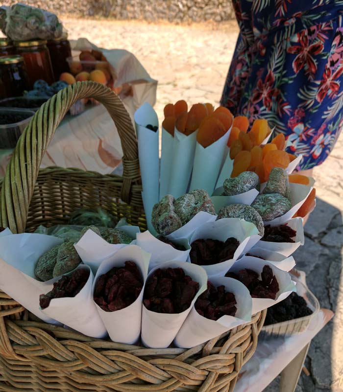 Dried fruits in a basket being sold on the street in bosnia.