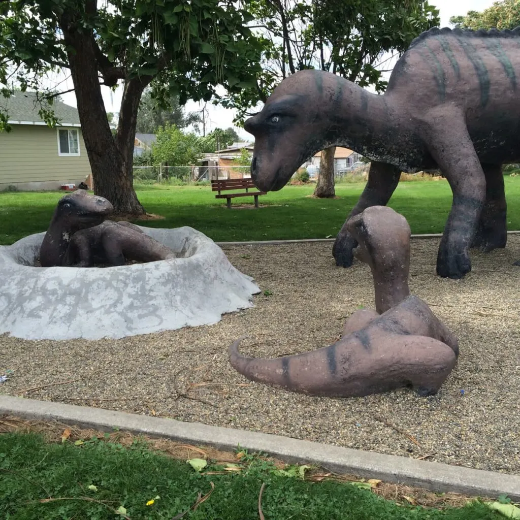 A dinosaur statue in granger, wa- as seen on a day trip from seattle.