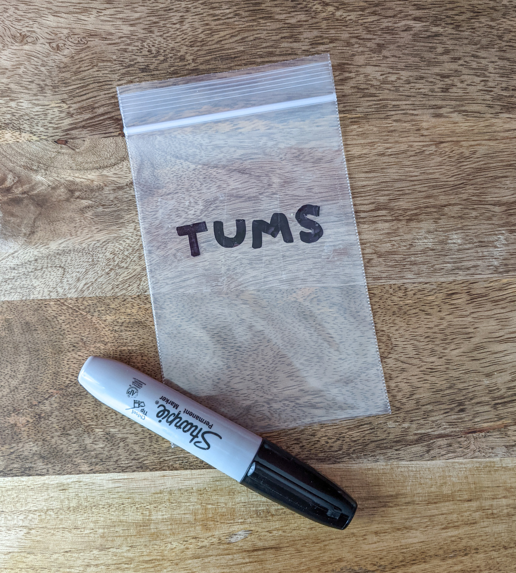 Vitamins and supplements being packaged for space saving travel packing.