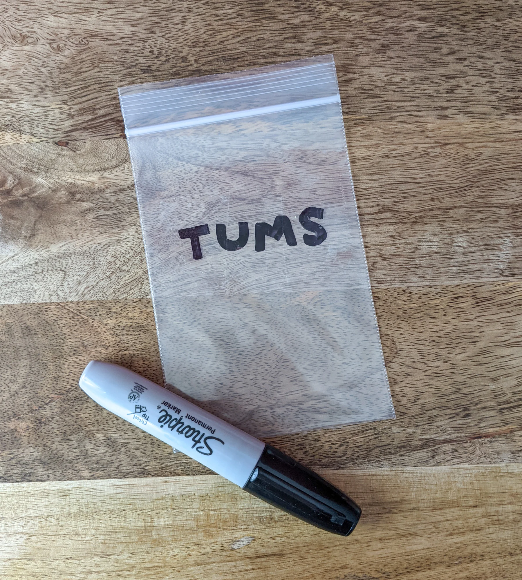 Vitamins and supplements being packaged for space saving travel packing.