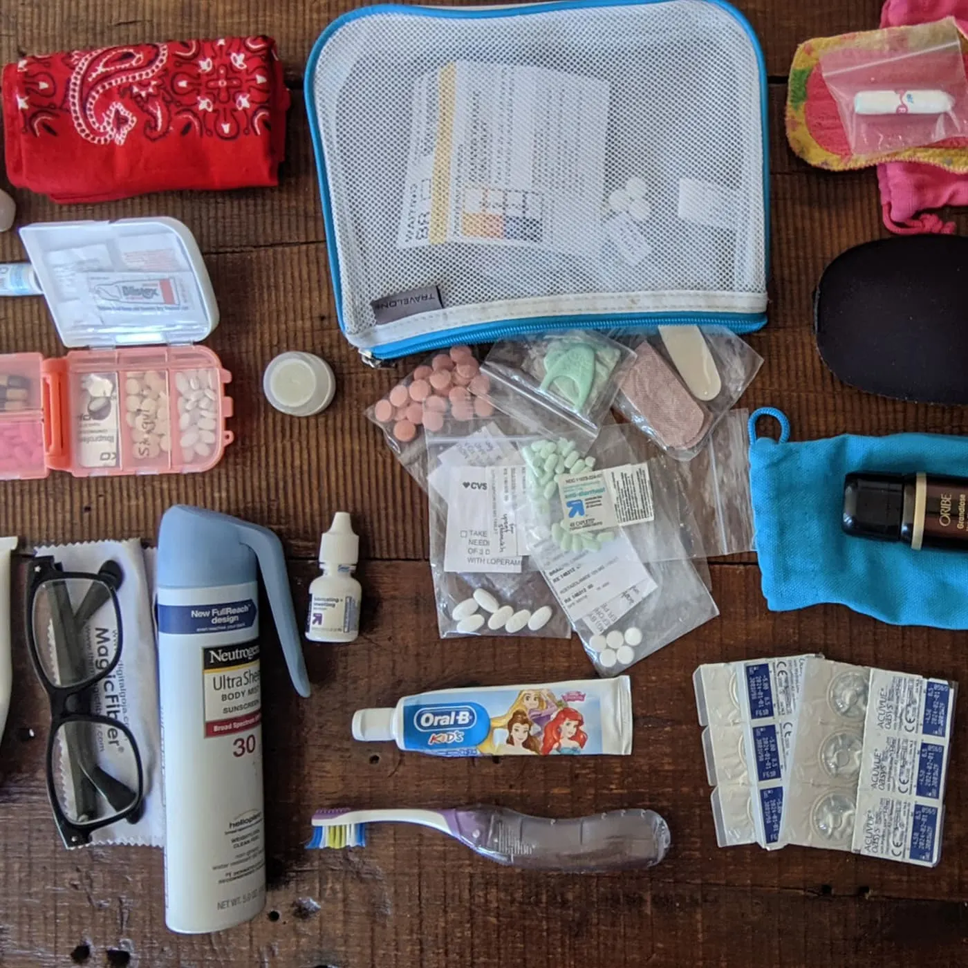 Packing list personal care items laid out on a table.
