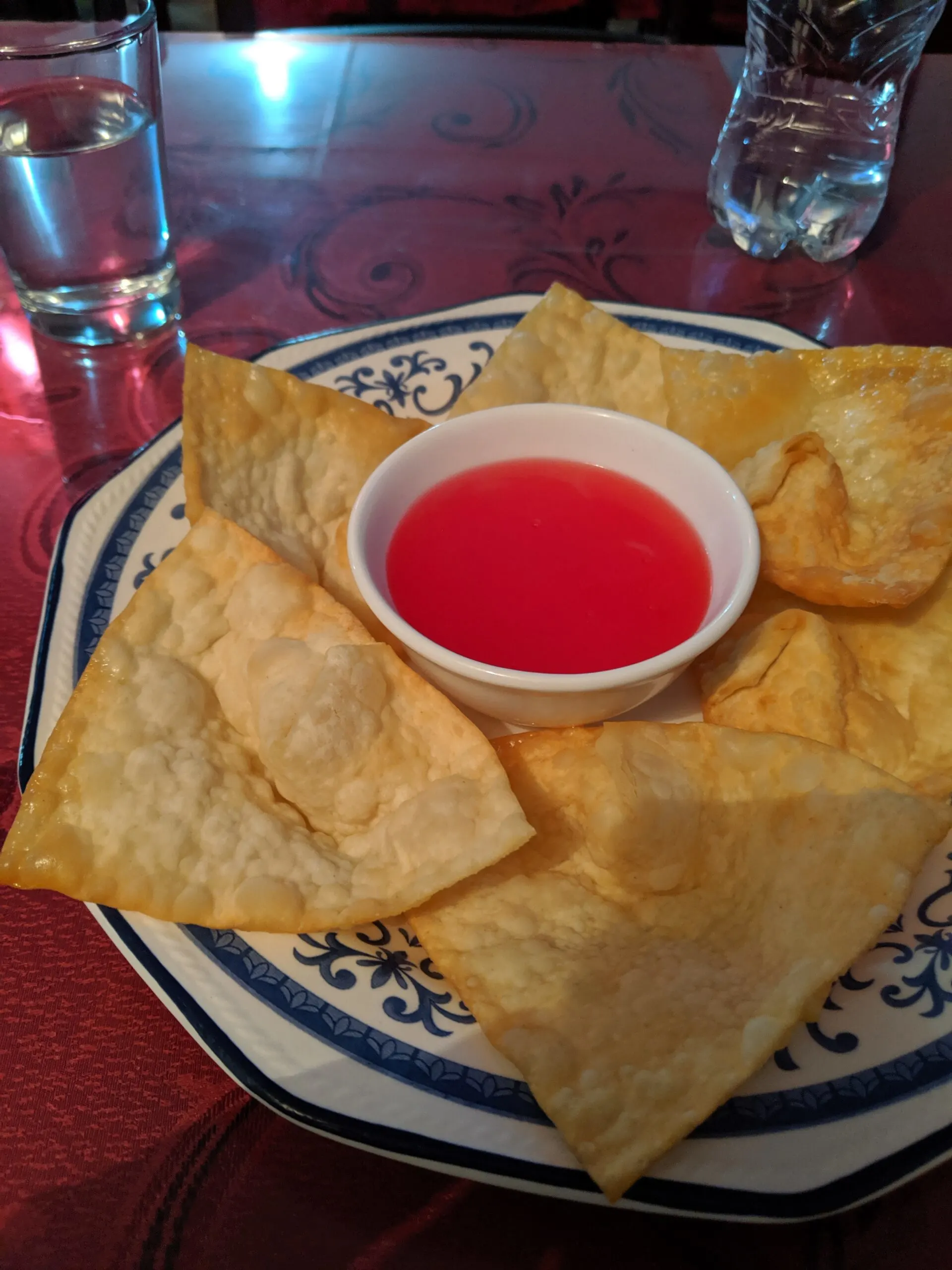 A plate of wontons in chifa cuisine restaurant in peru.