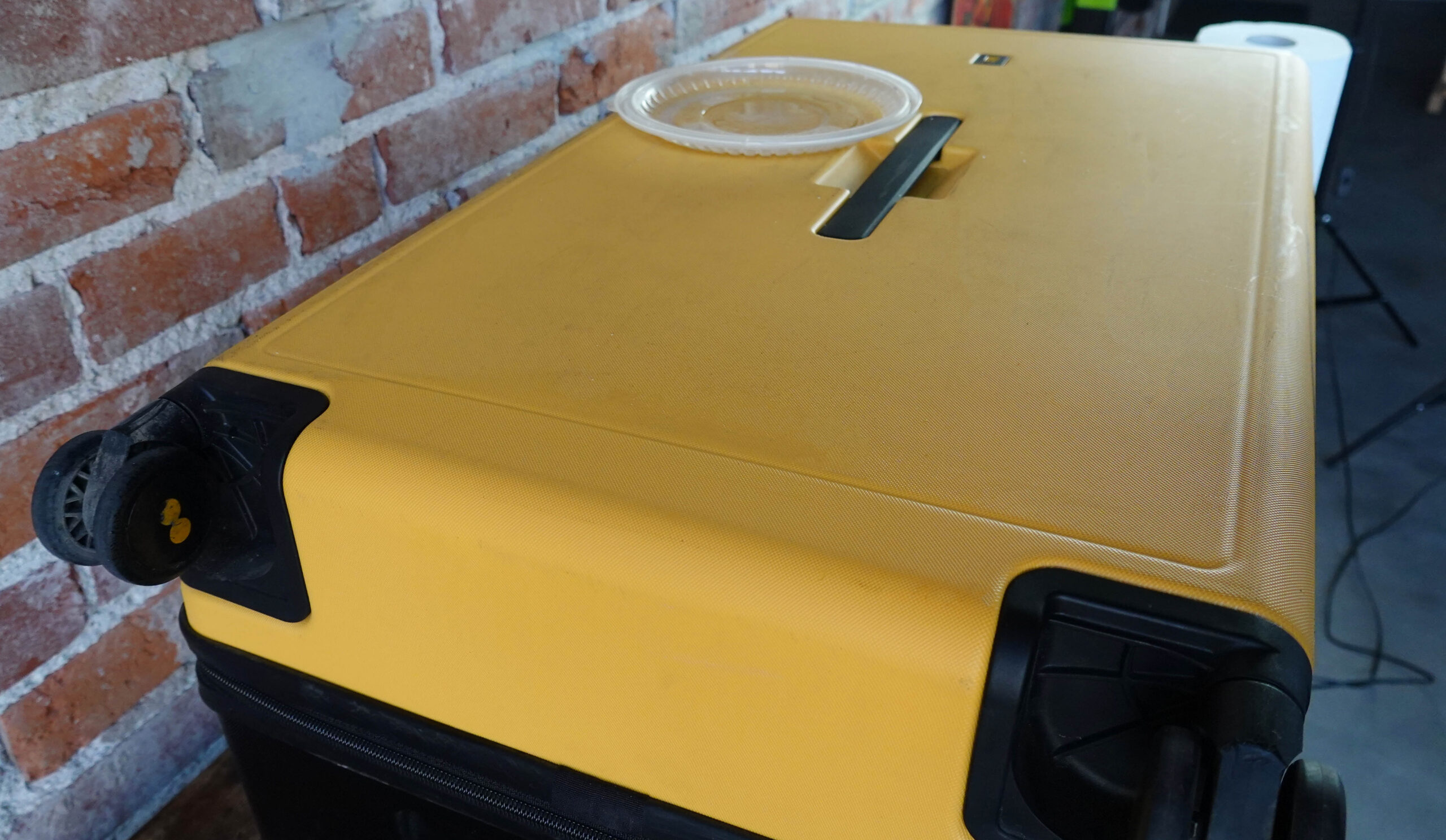 A hard shell suitcase after cleaning.