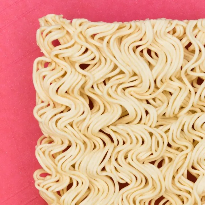 ramen noodles on a pink background