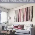 An andean woven blanket frazada hanging in an office as a wall hanging