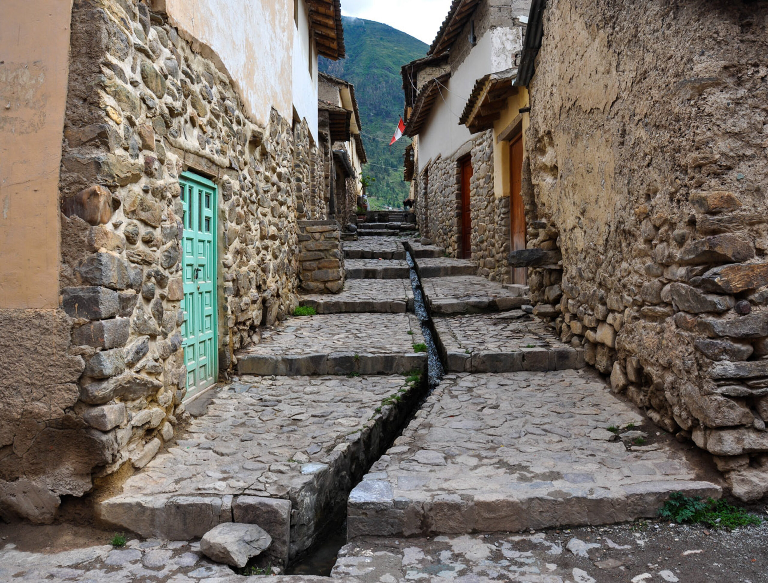 An image of an original incan street and ollaytaytambo peru.