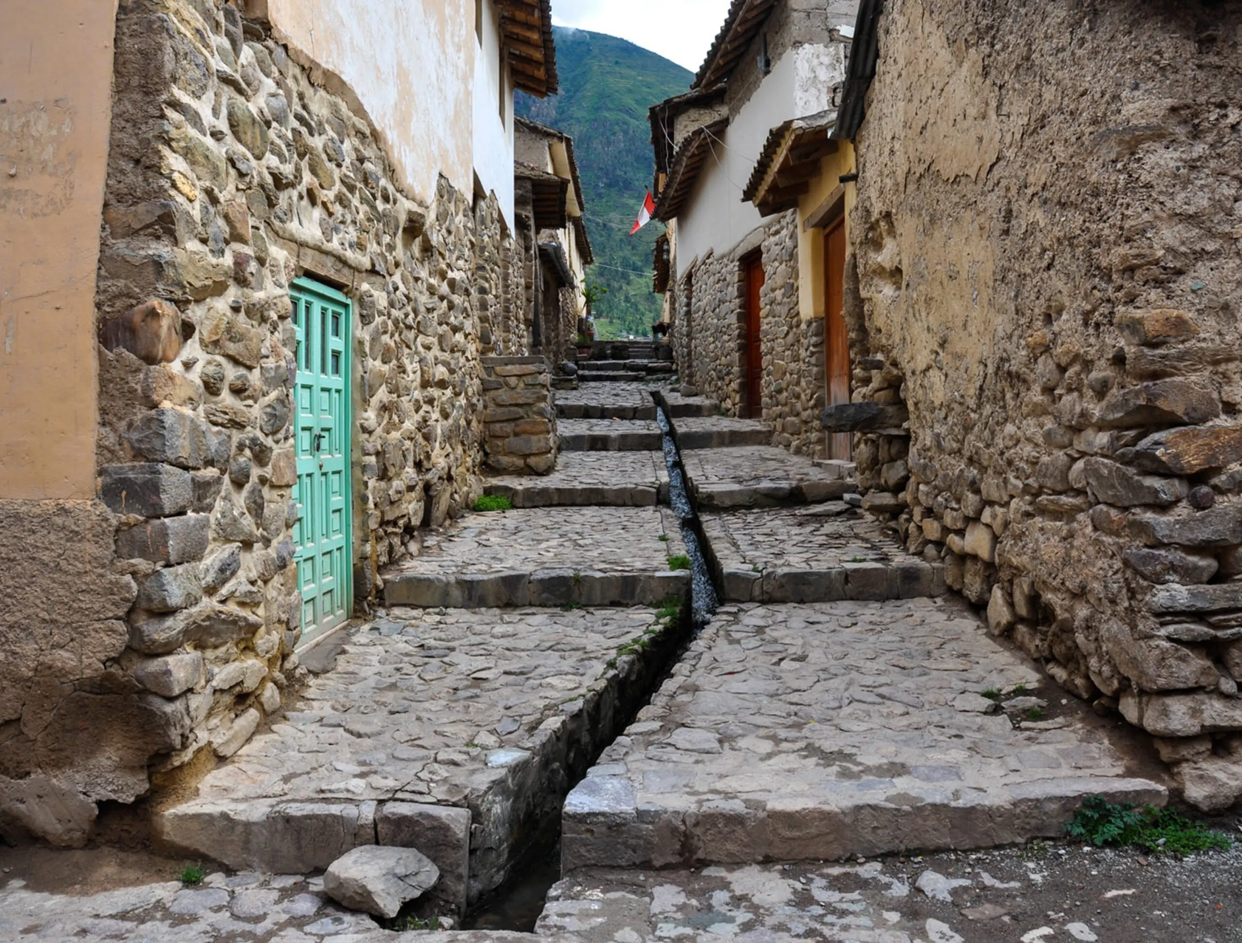 An image of an original incan street and ollaytaytambo peru.