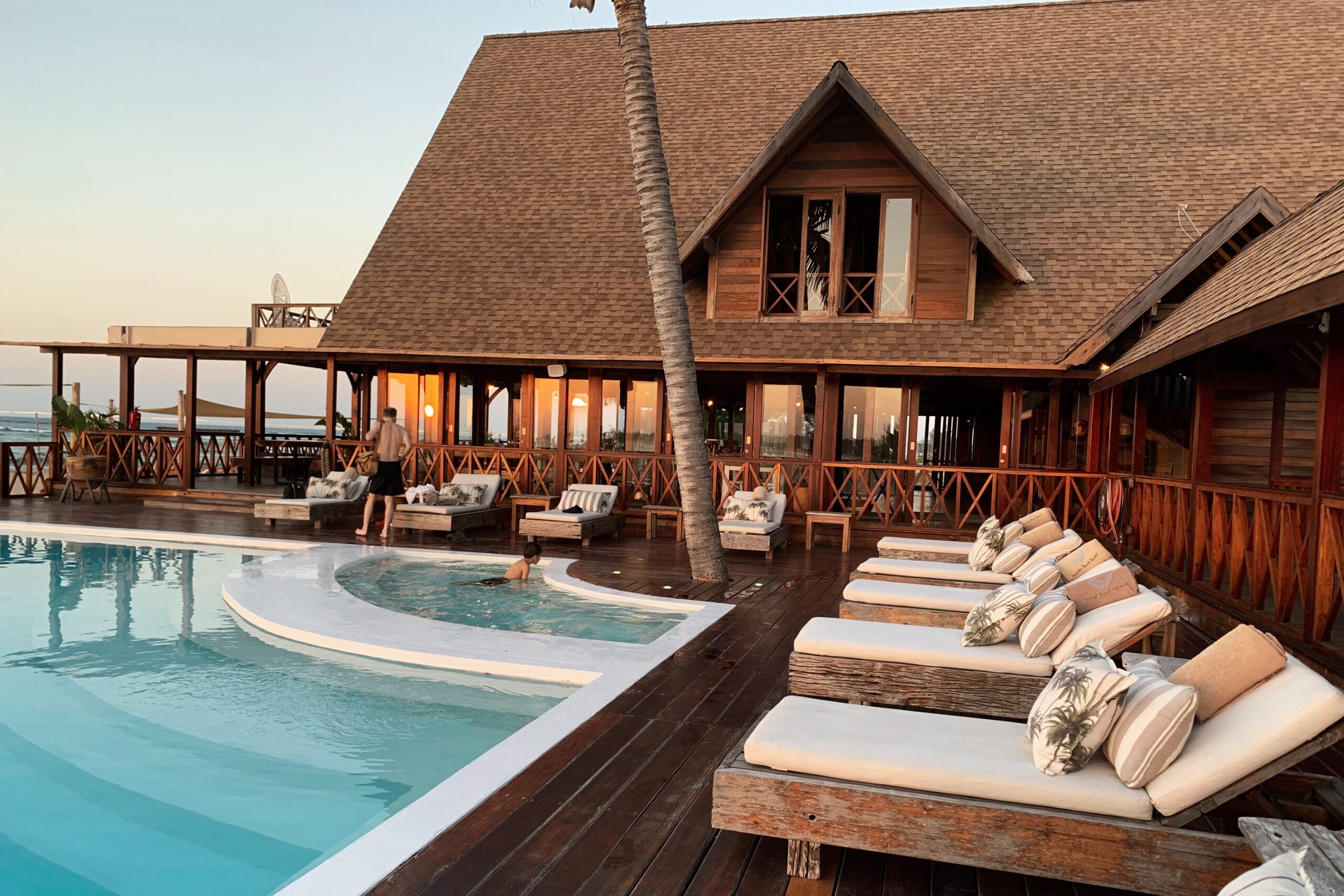 An almost empty beach front resort.