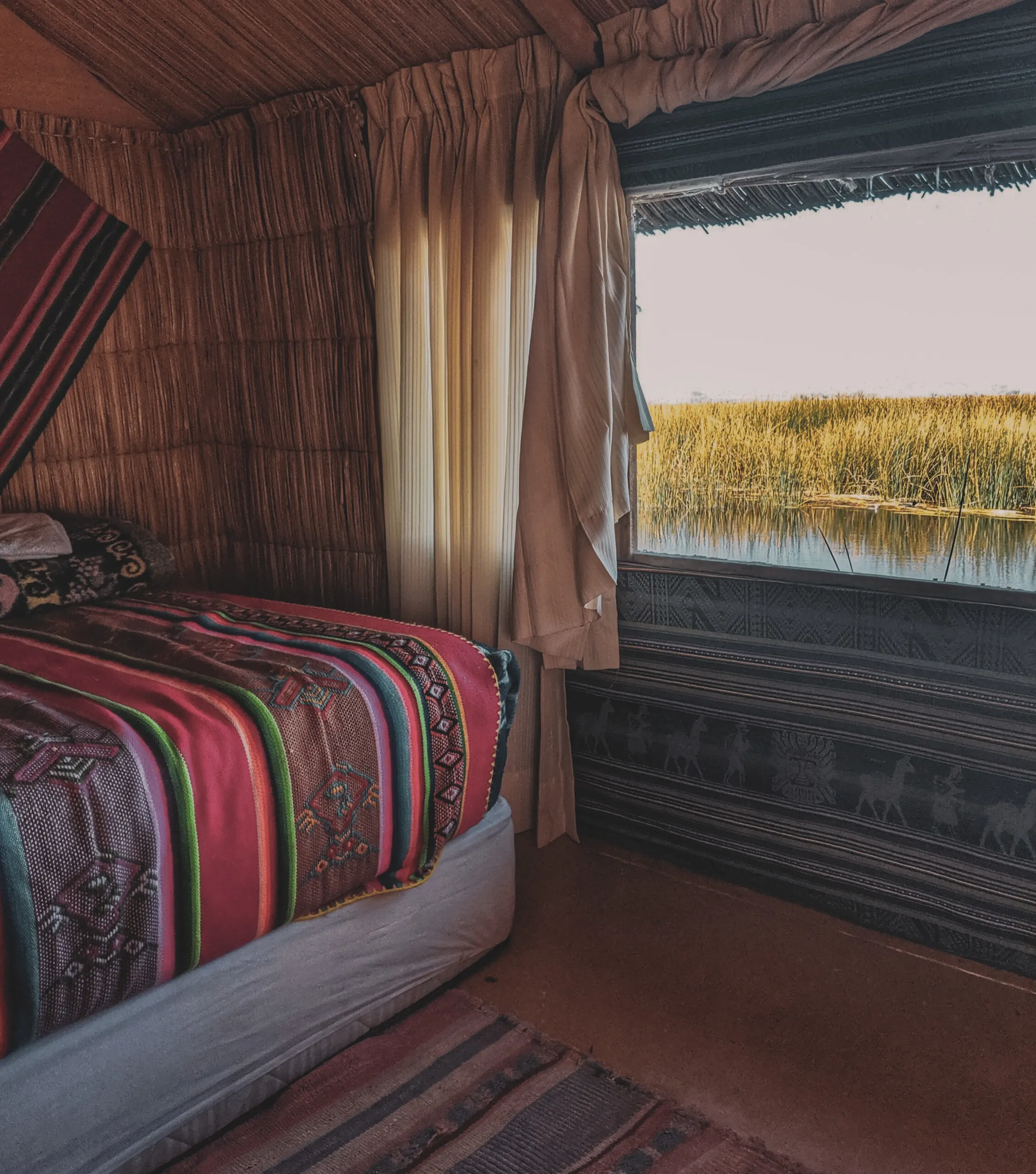 A bedroom in a guesthouse on an uros island.
