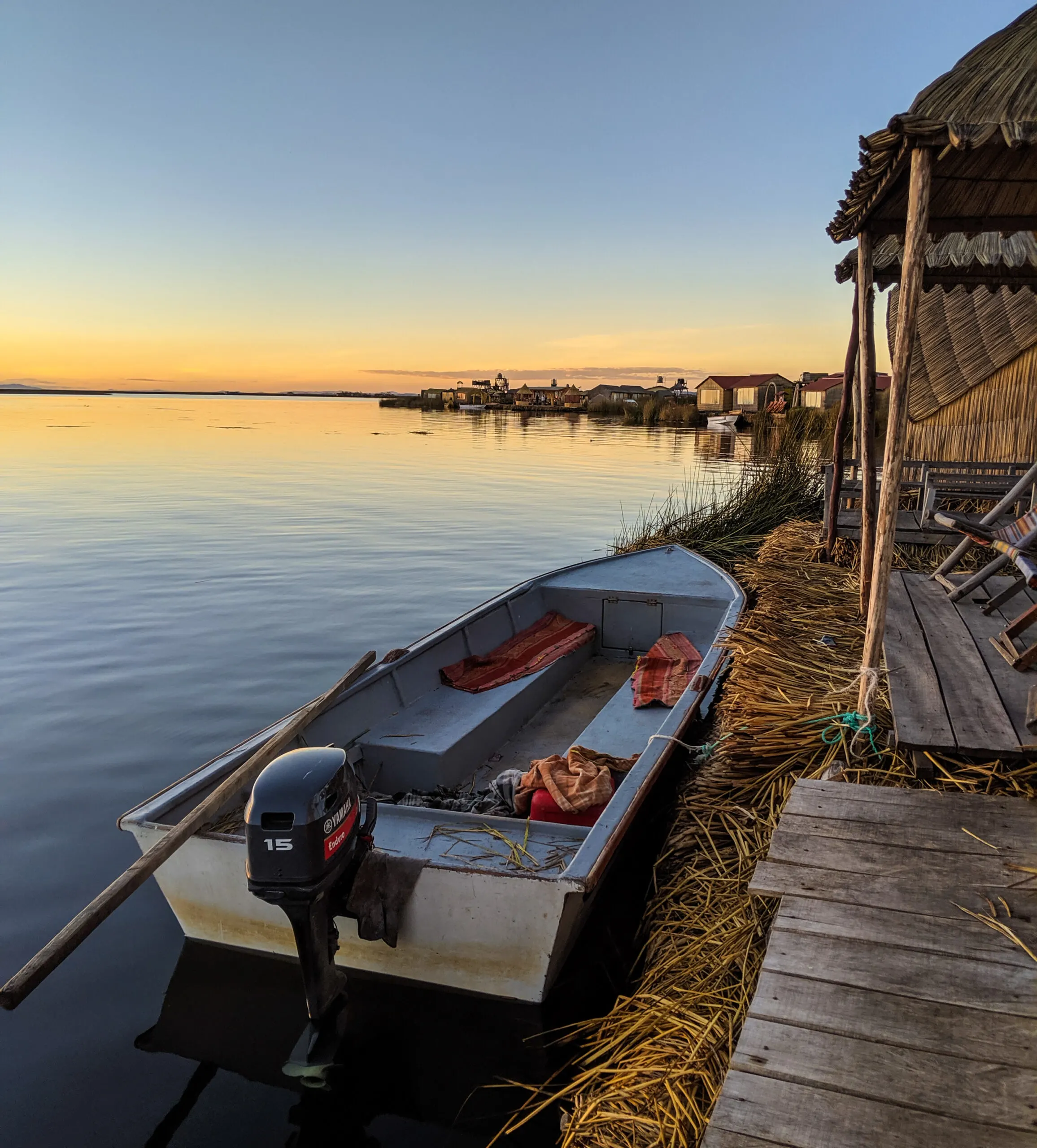 Sunset on a floating island in the uros village.