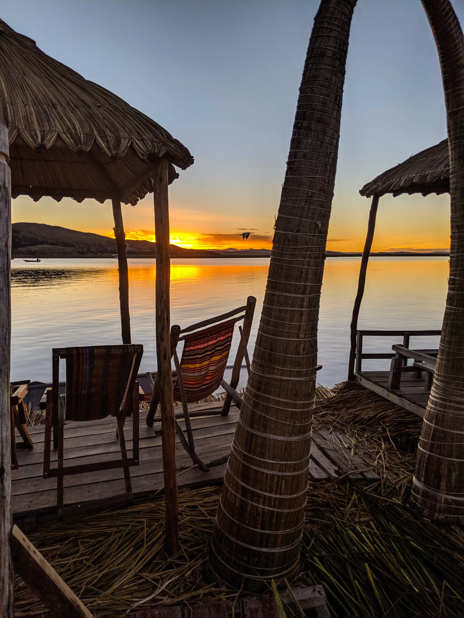 Sunset on a floating island in the uros village.
