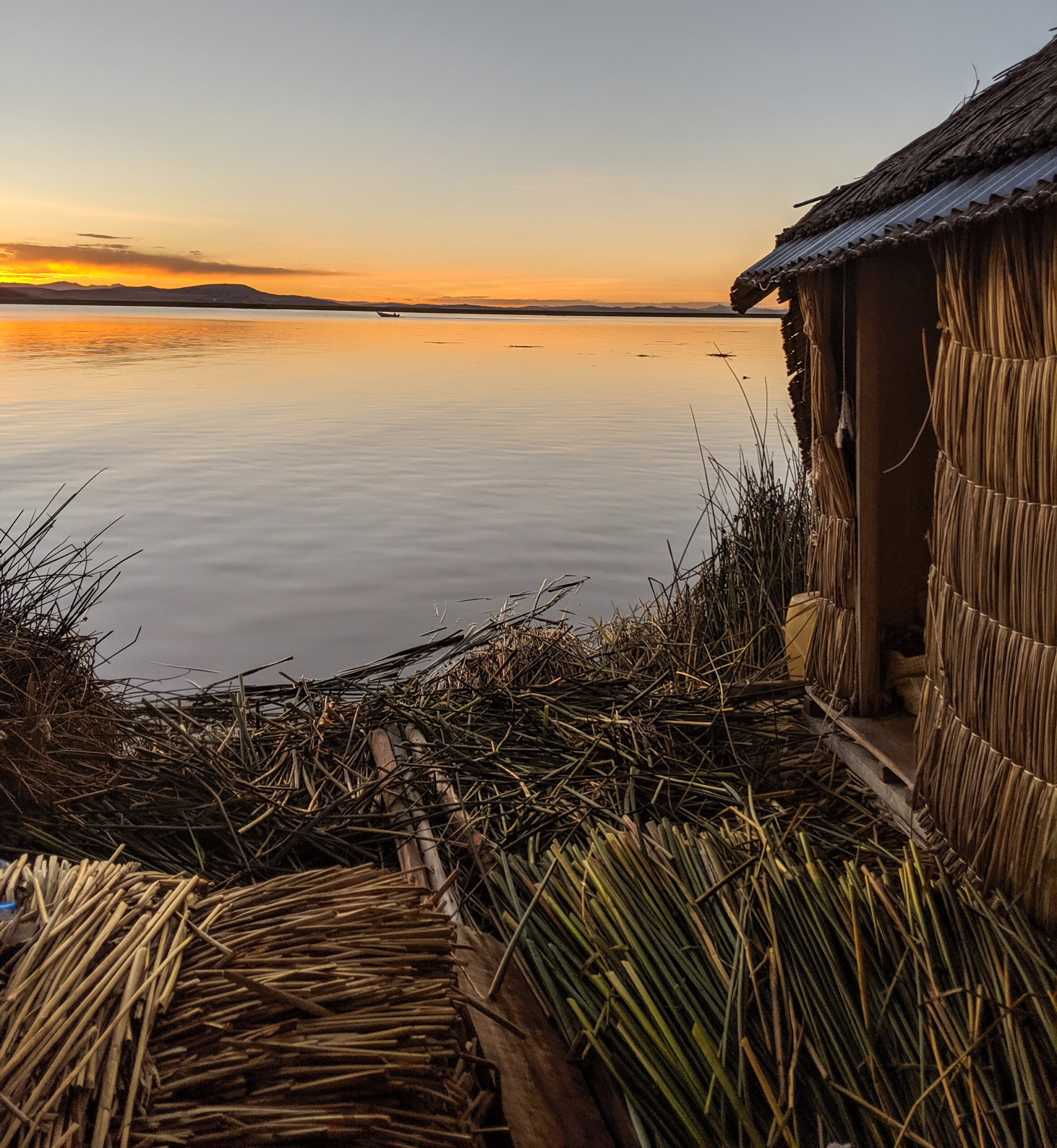 Sunset on a floating island in the uros village.