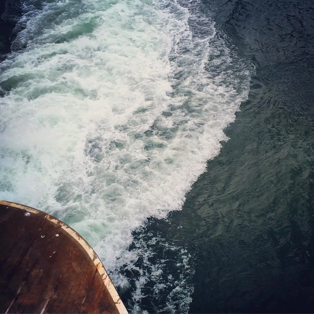 The week behind a washington state ferry crossing the puget sound.