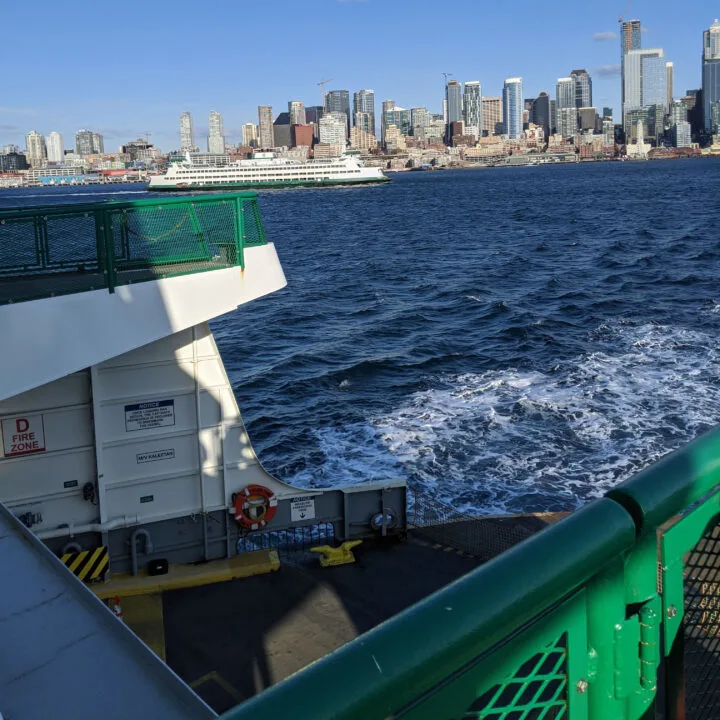 Washington State Ferry leaving Seattle bound for Bainbridge Island, with the Seattle skyline in the background.