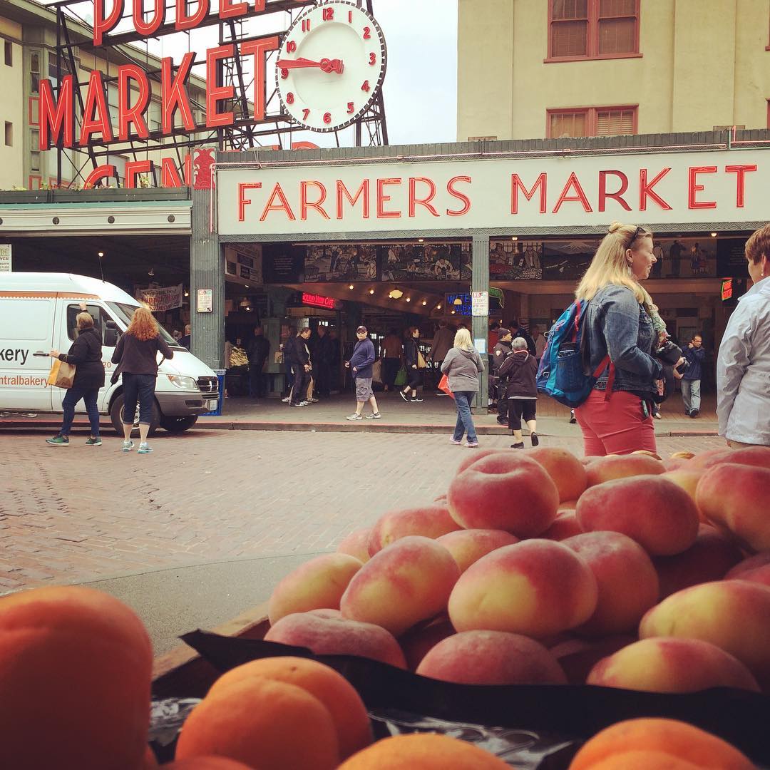 Peaches on display just outside of the main entrance to seattle's pike place market.