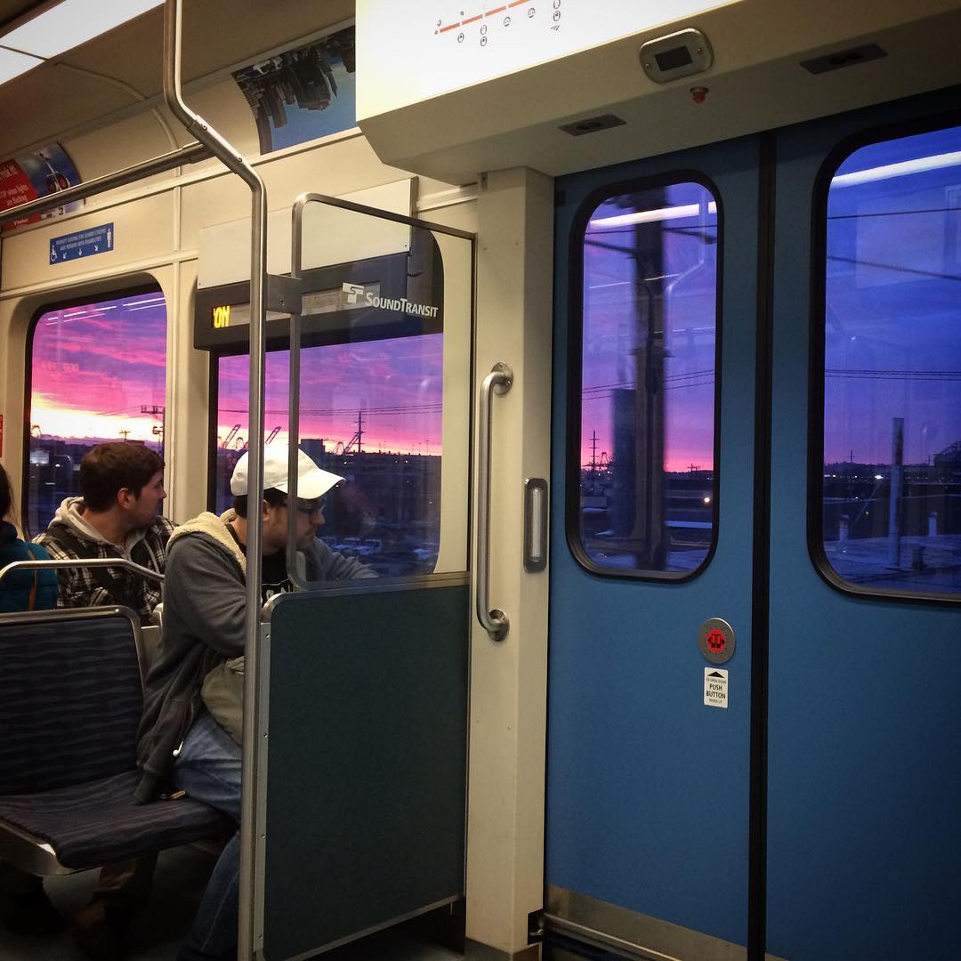 Sunset as seen from seattle's link sound transit light rail train.