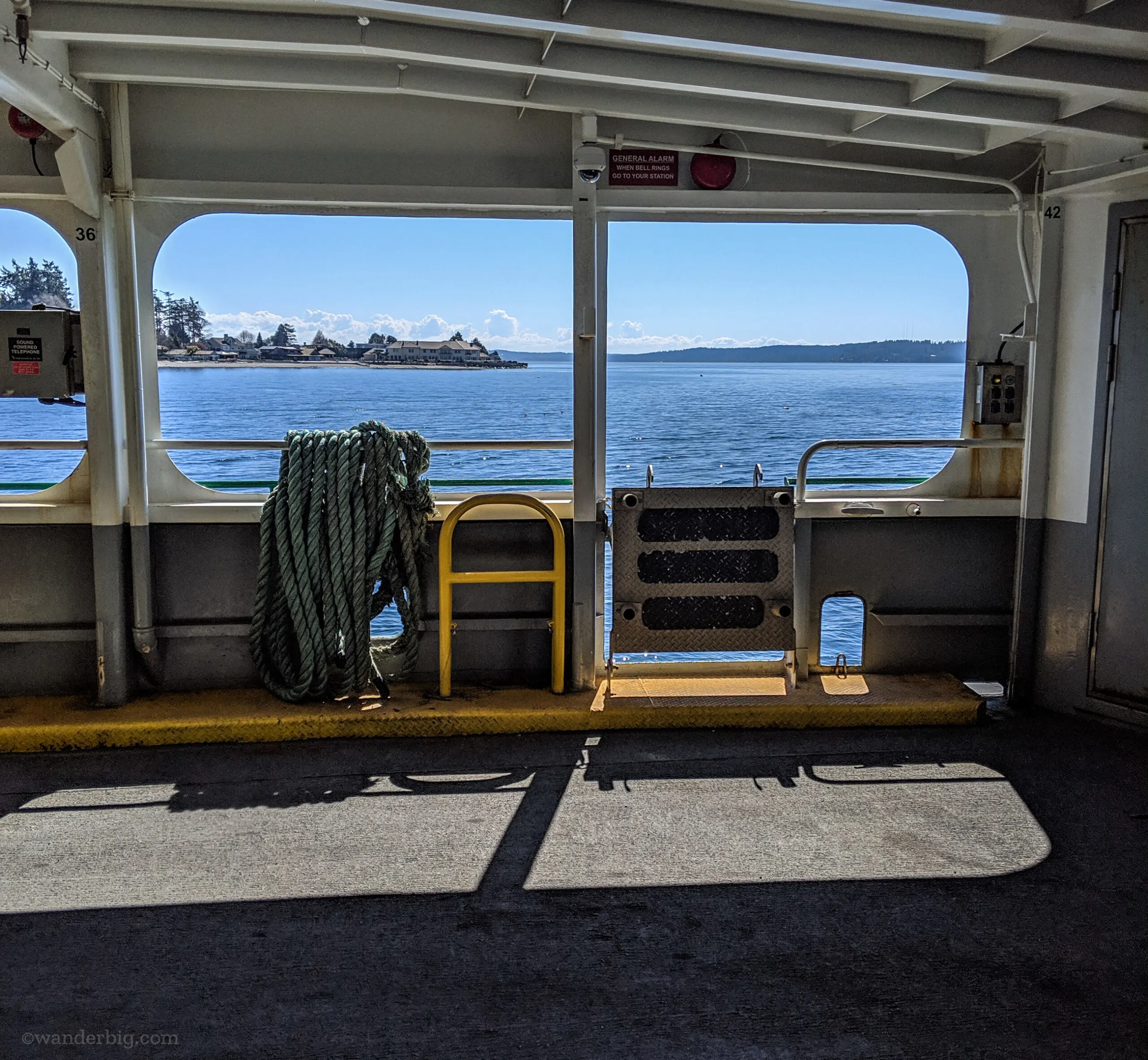 Bainbridge island as seen from the deck of a ferry.