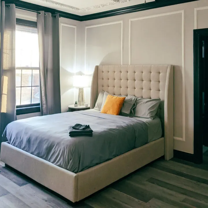 A bed in an Airbnb apartment.