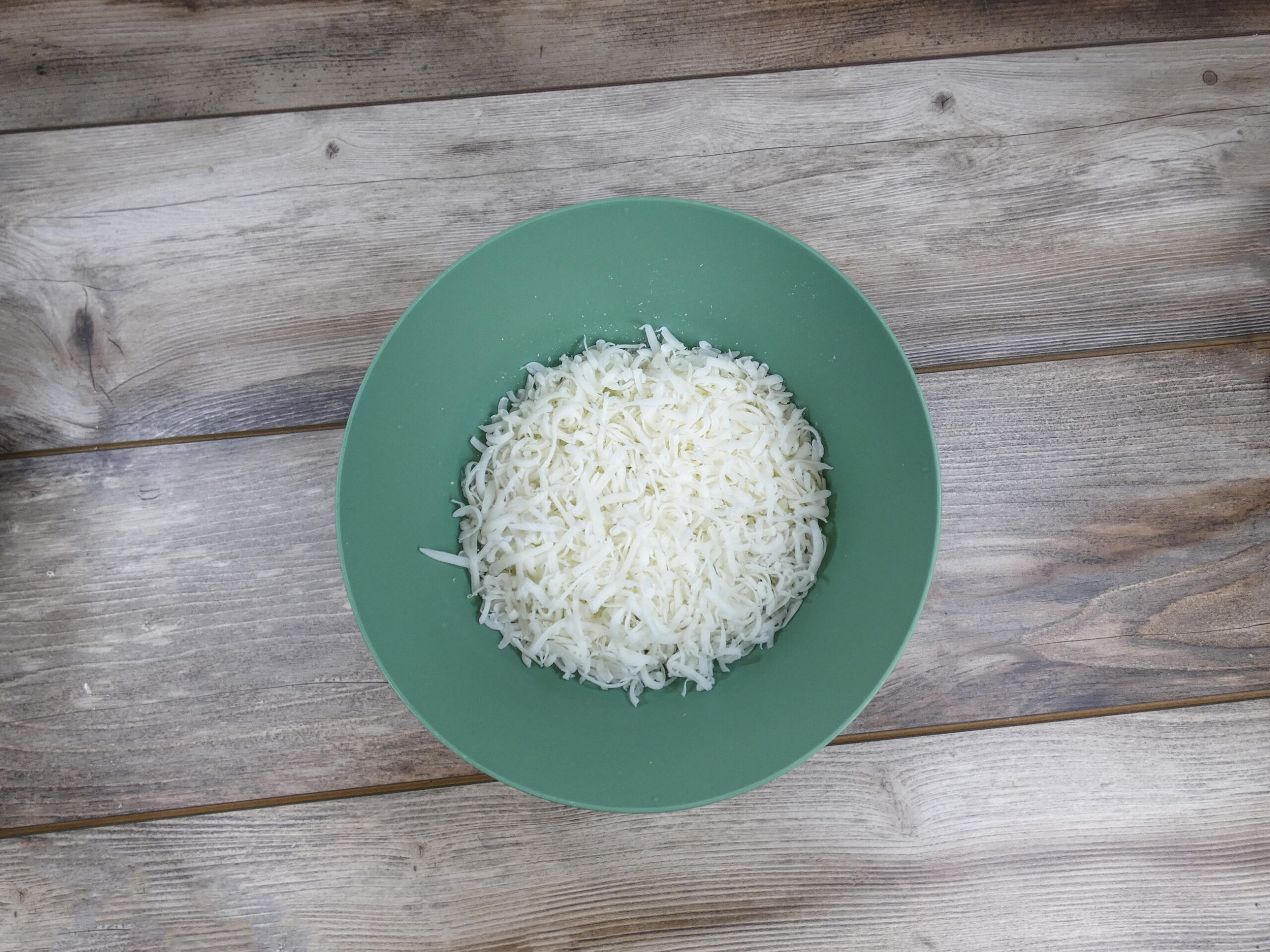 Grated soap prepared for making laundry detergent sheets.