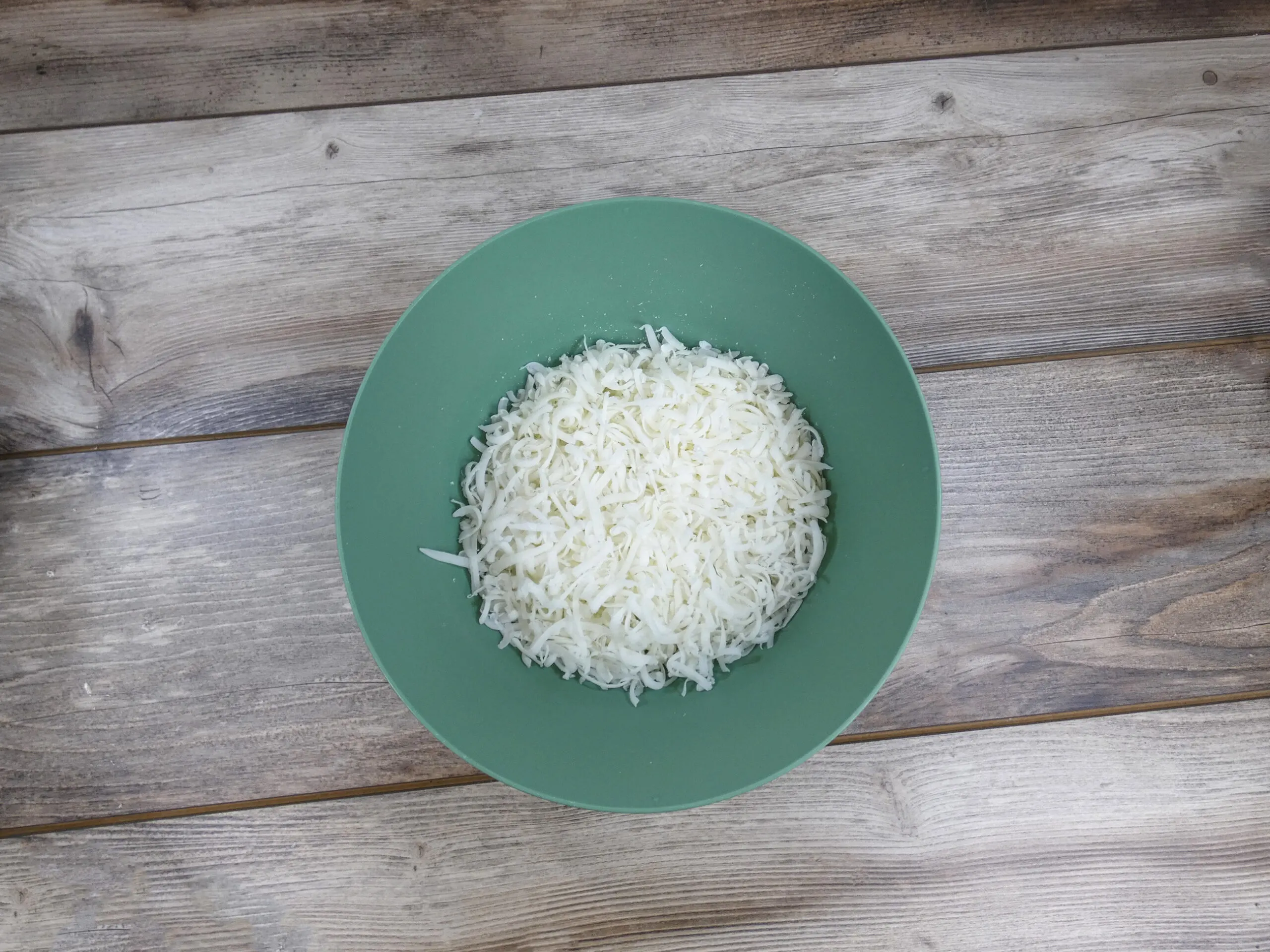Grated soap prepared for making laundry detergent sheets.