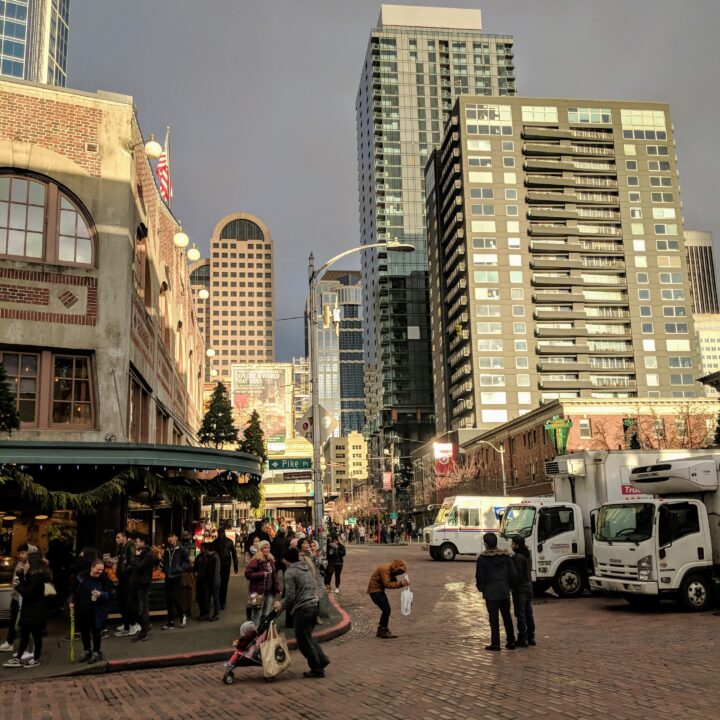 Seattle's city skyline as seen behind Pike Place Market, a destination in this 24 hours in Seattle Itinerary.