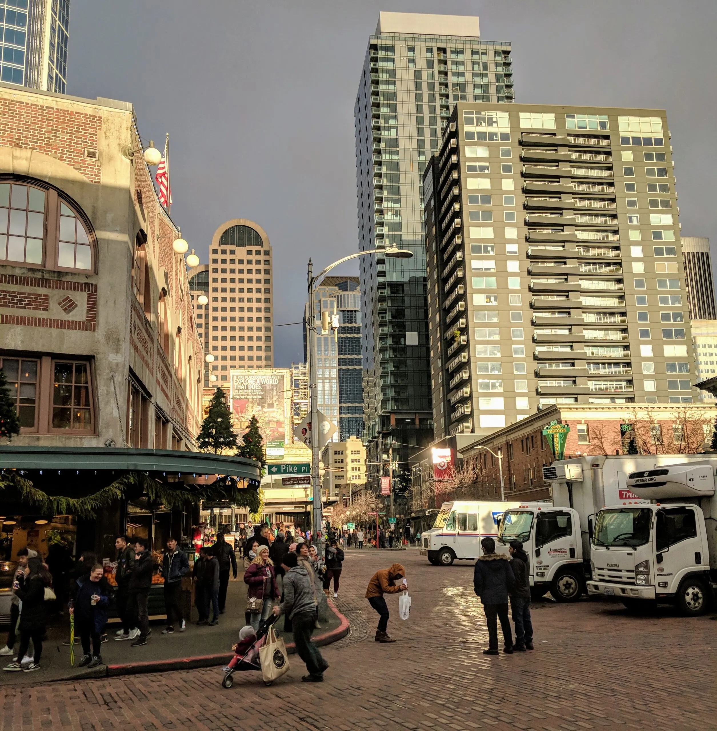 Seattle's city skyline as seen behind pike place market, a destination in this 24 hours in seattle itinerary.