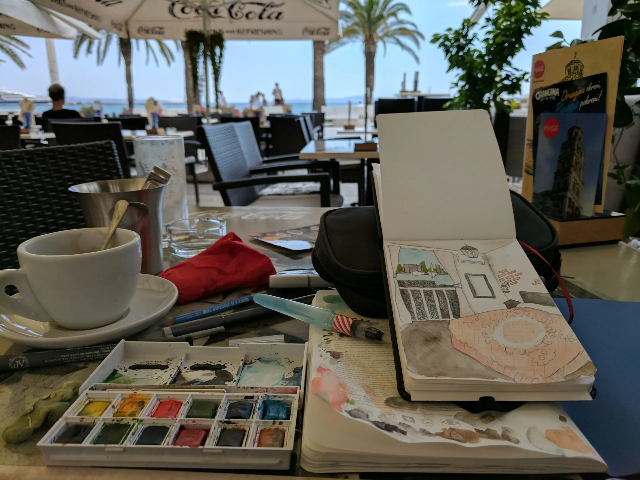 Enjoying a hobby is a great way to not pity yourself when eating out alone.