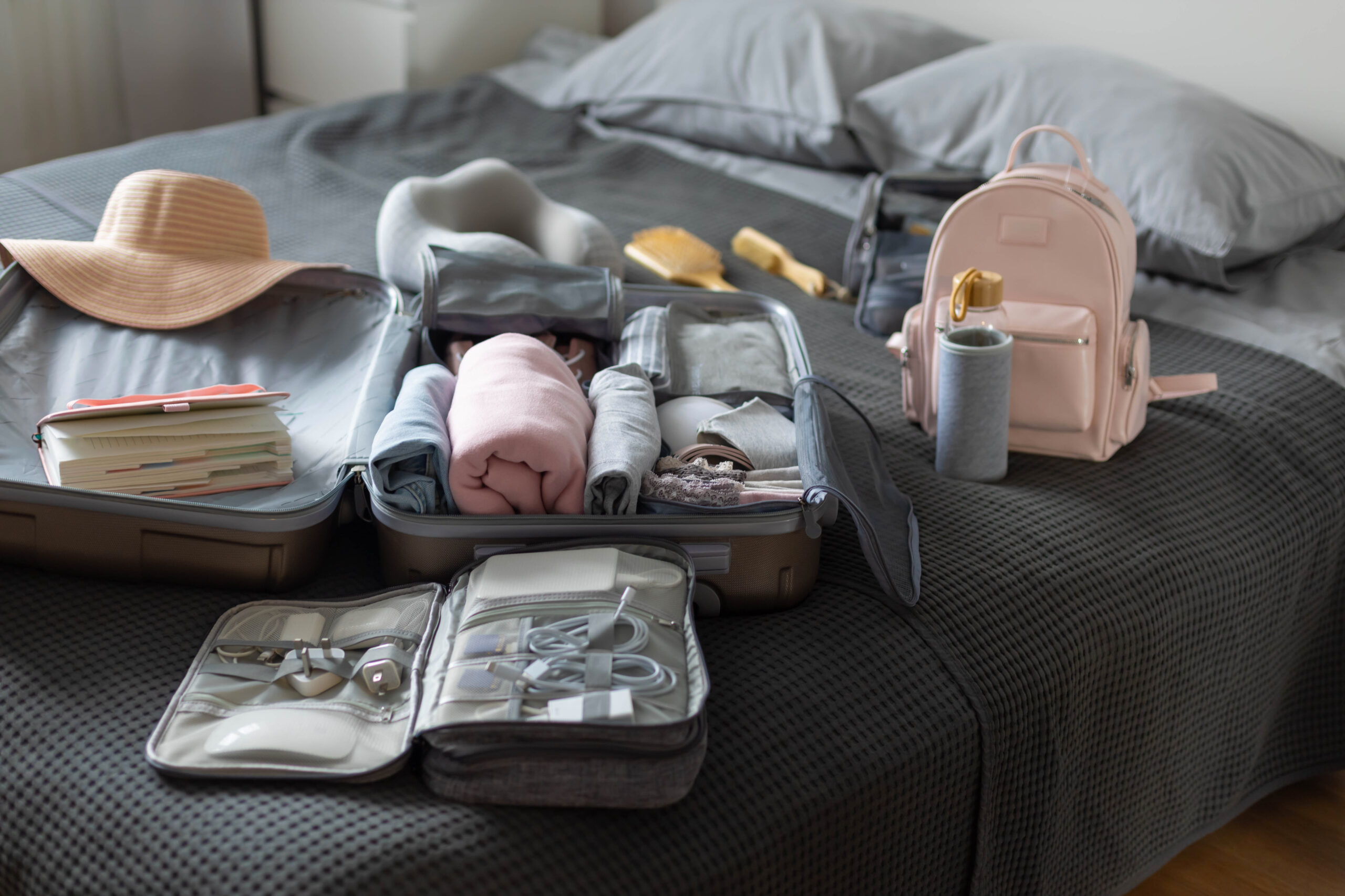 A half-packed suitcase on a bed
