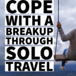Woman on a swing with a travel landscape in the background.