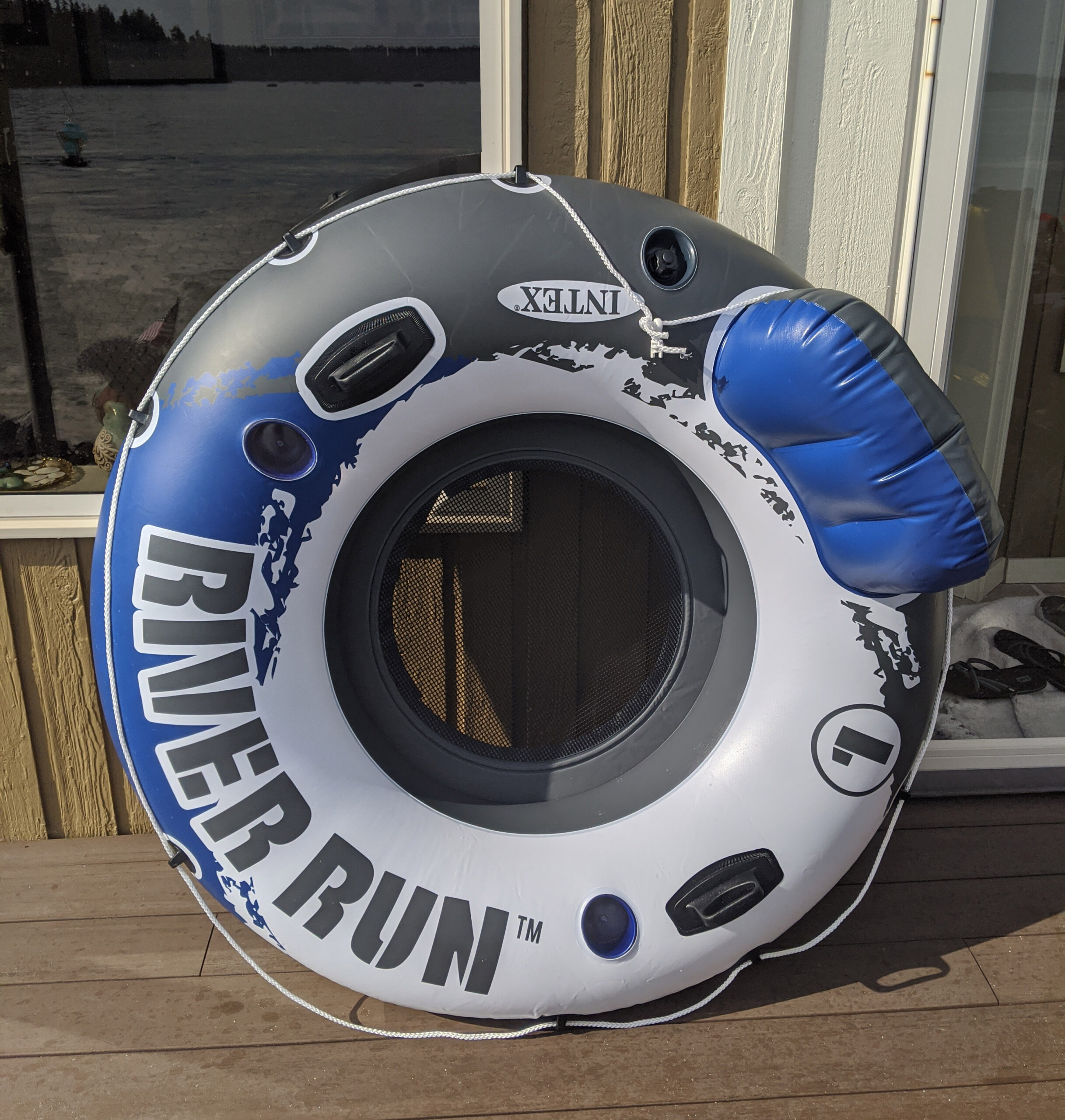 My favorite inner tube for river floating has a mesh bottom and ropes for connecting to other rafts.