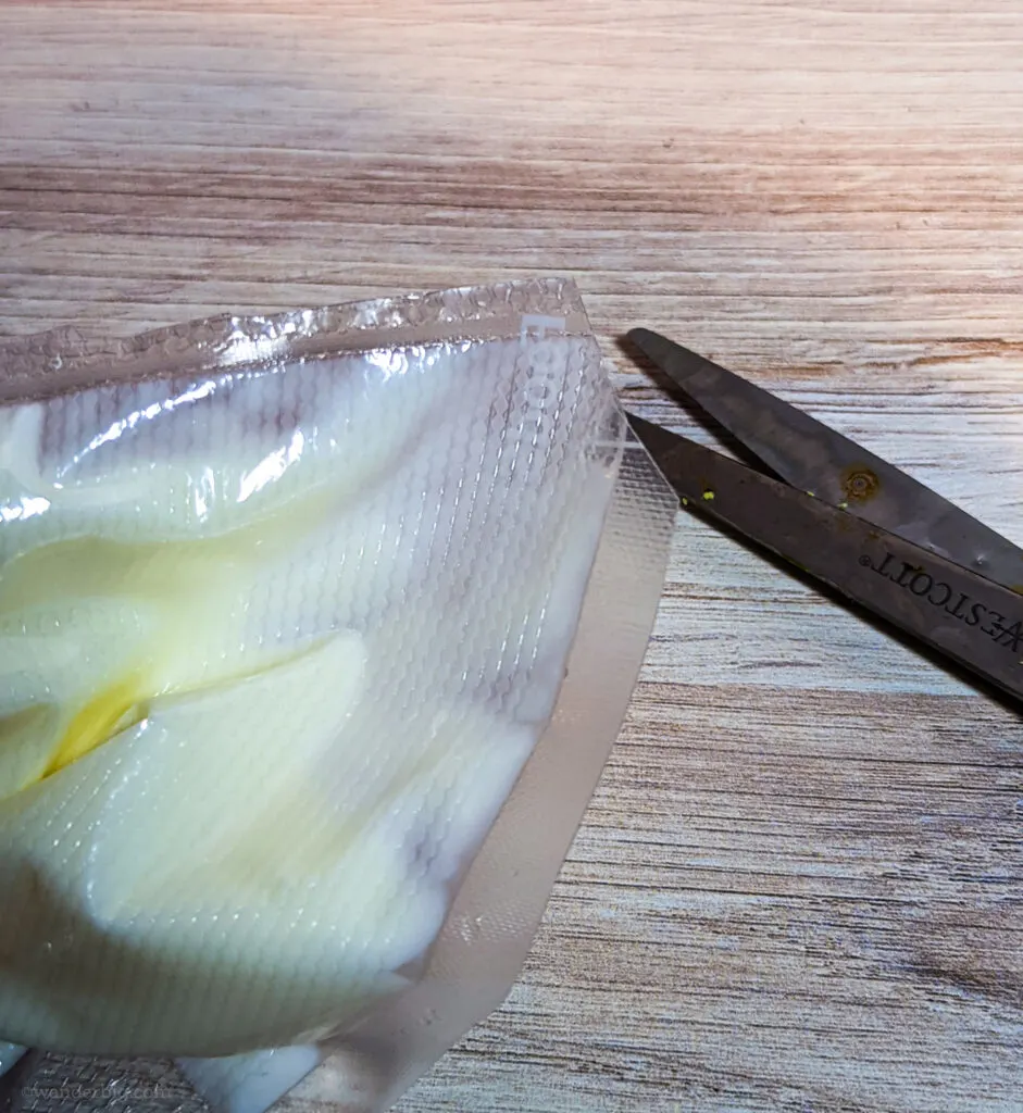 Melted deodorant in a plastic bag with the corner snipped off.