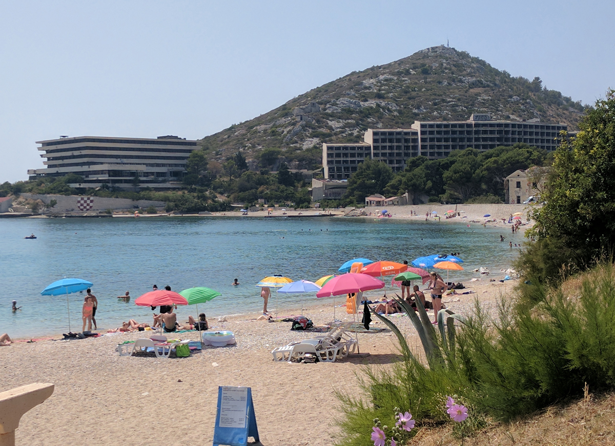 Sunbathers on a beach in croatia.
