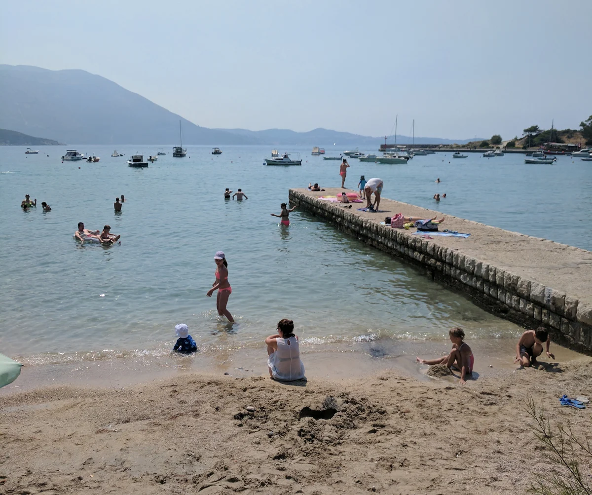Sunbathers on a beach in croatia.