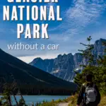 A photo of glacier national park with a person walking down a trail.