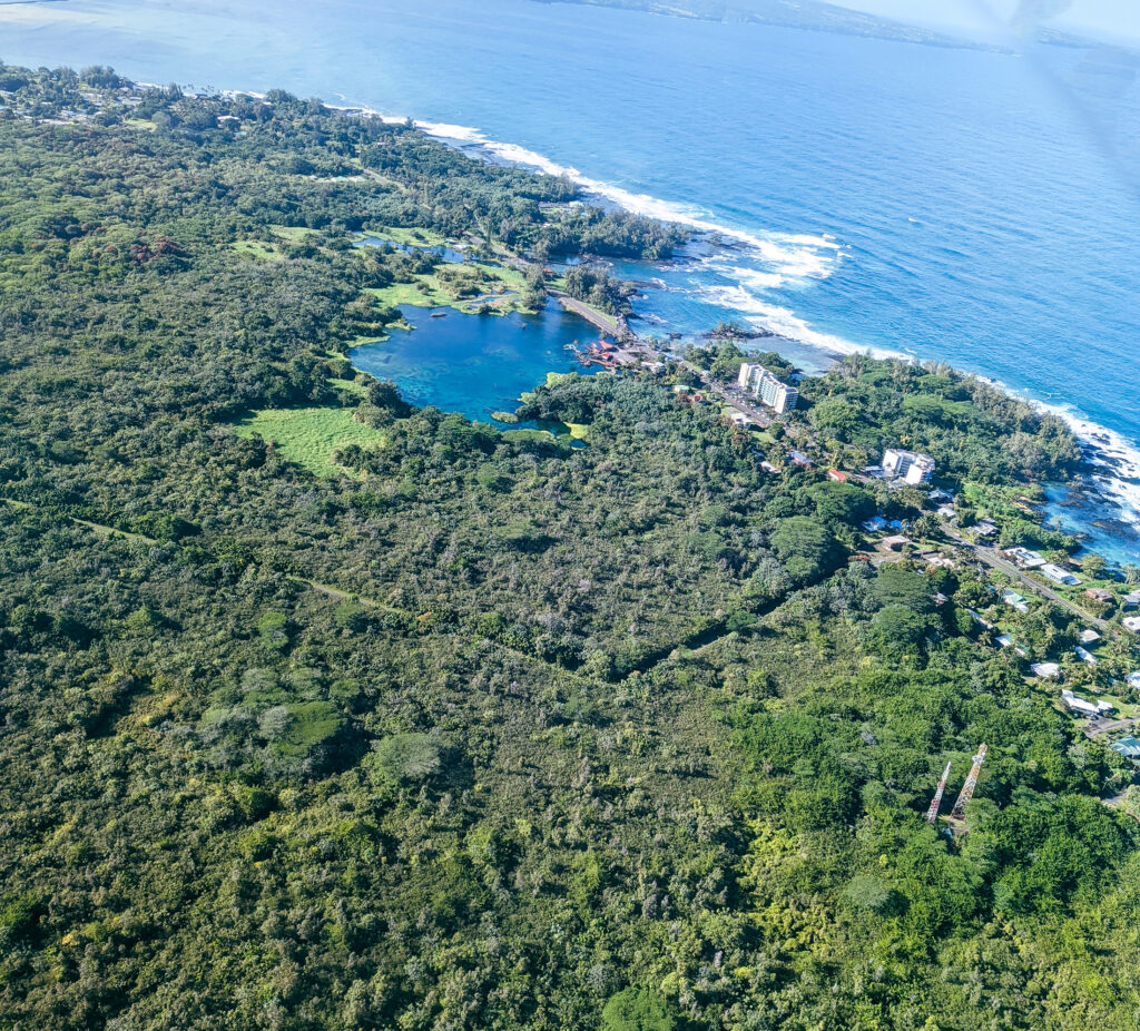 The beach parks of hilo, hawaii as seen from an aerial view.
