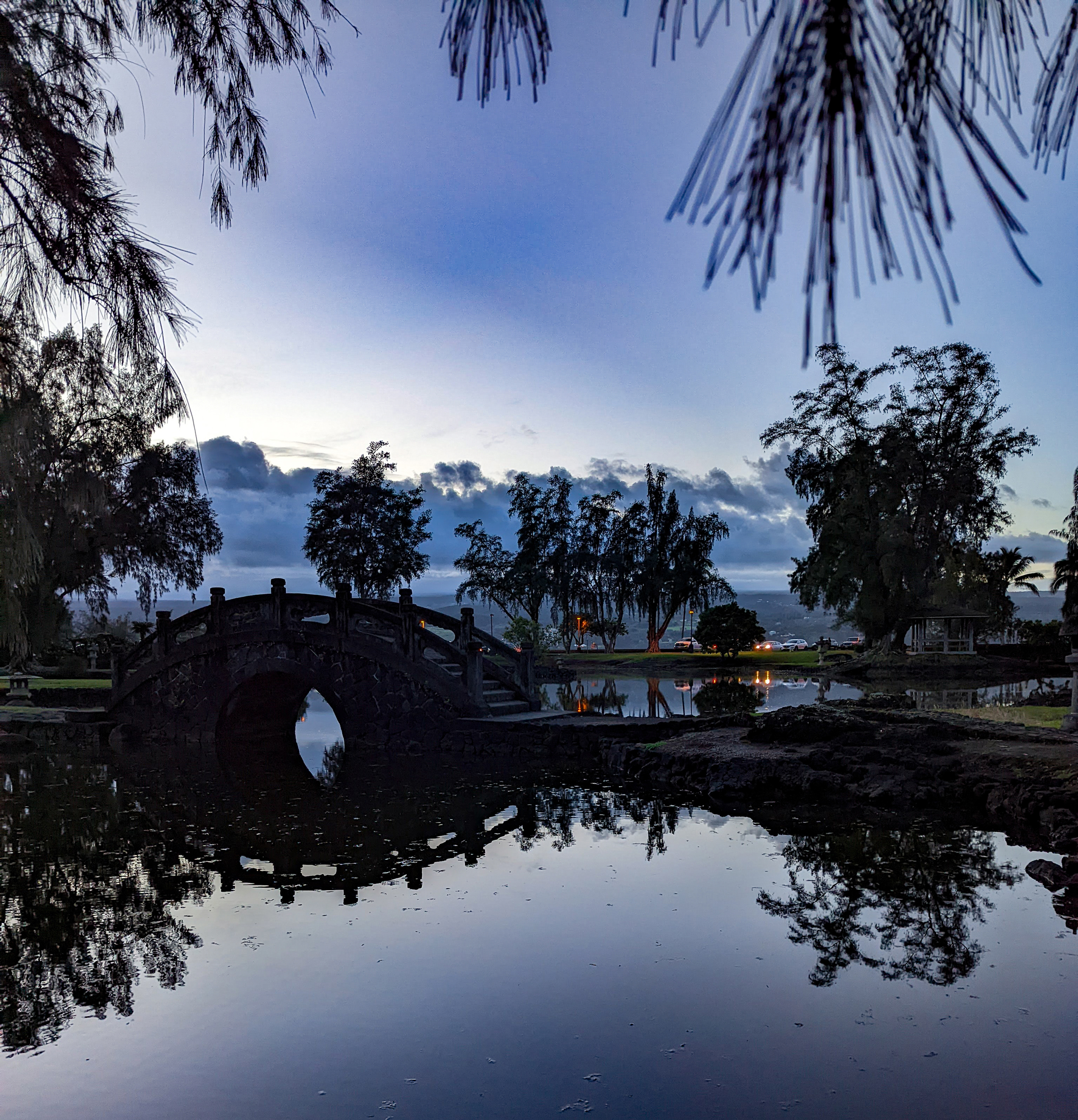 A japanese garden in hilo hawaii at sunset