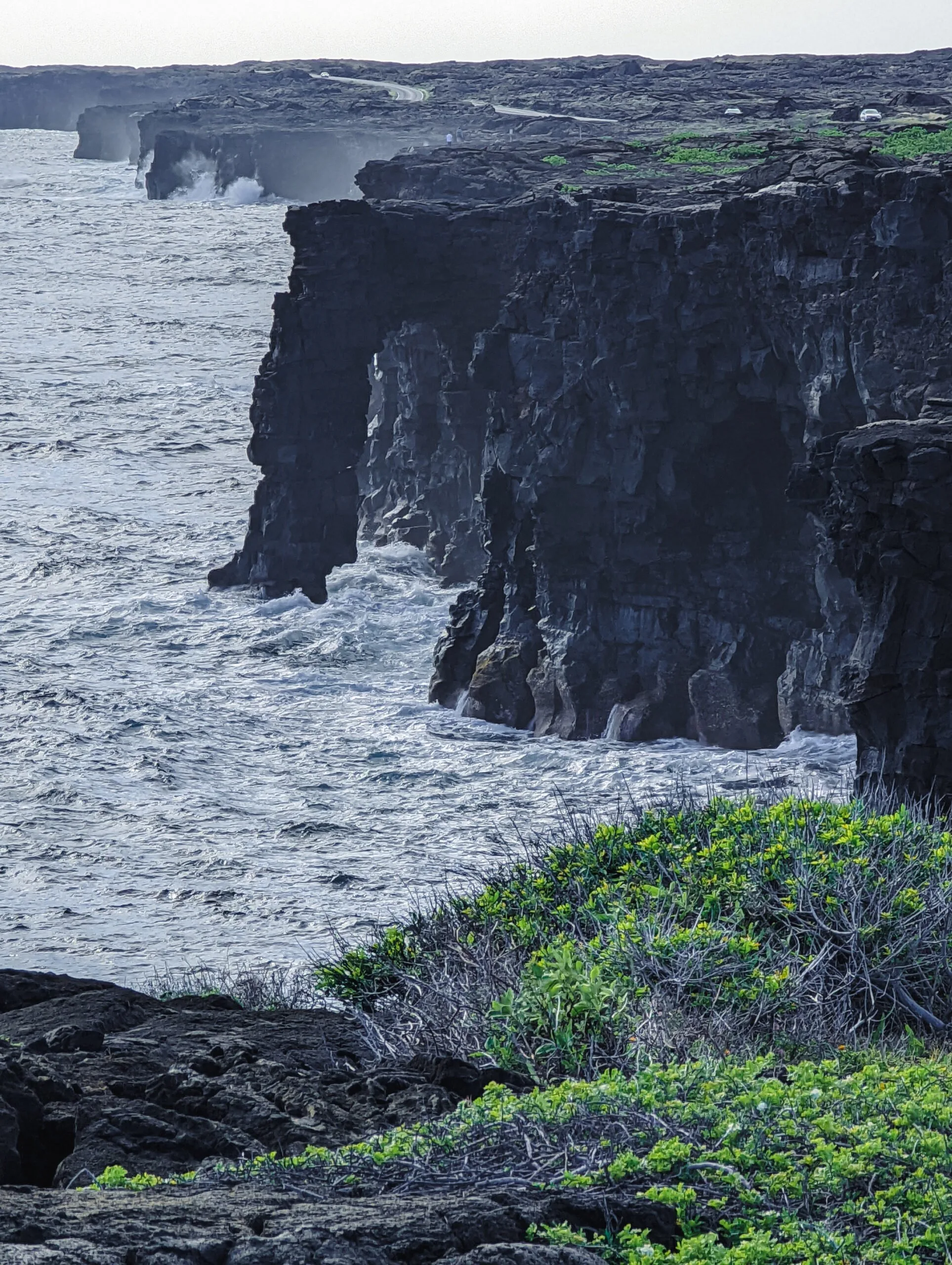 A sea arch on the coast of the big island at hawaii volcanoes national park.