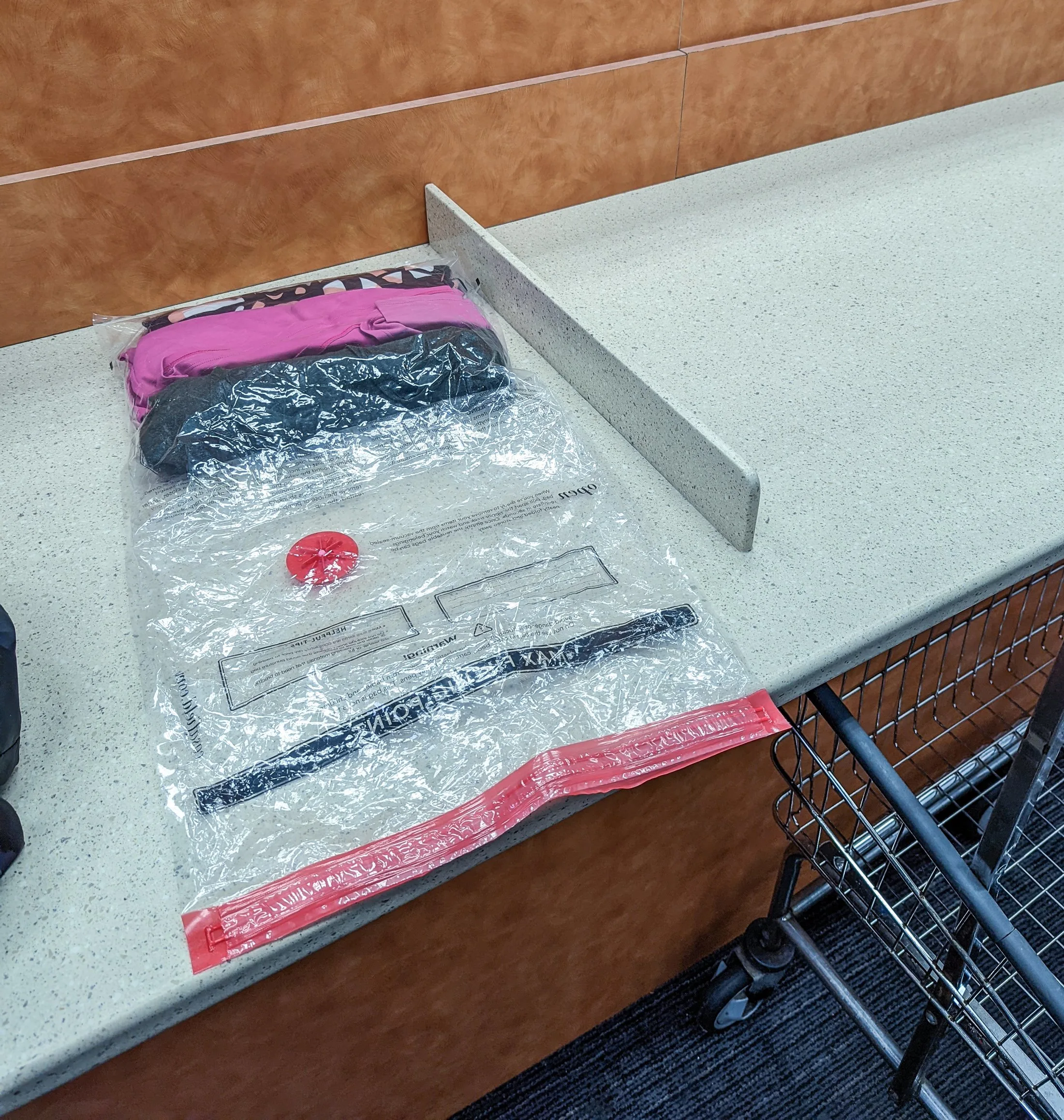 Clean clothing packed inside of a large resealable bag.