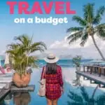 A woman stands on the edge of a hotel pool near a waterfront, with the test overlay how to plan luxury travel on a budget.