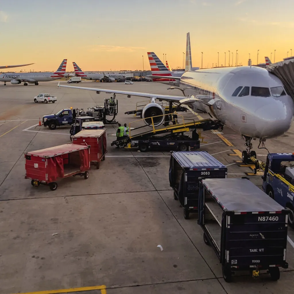 A plane photographed from a airport gate.